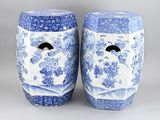 pair of blue and white porcelain garden stools with floral designs