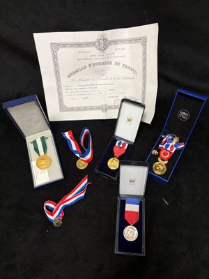 a group of medals and medals sitting on top of a table