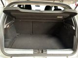 a trunk of a car with the back door open