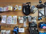 many items on the wall in the store for sale
