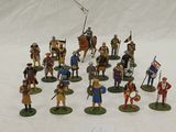 a lot of figurines that are sitting on a table