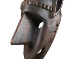 an image of a wooden mask on a white background