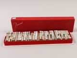 an image of a red box filled with lots of silverware