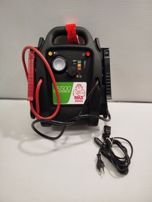 a black and red air compressor sitting on a table