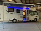 an image of a camper parked in a garage