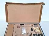 a cardboard box with a set of tools inside of it