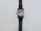 an image of a watch with a tag attached to it ' s strap