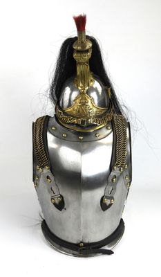 a silver helmet with a red mohawk on it