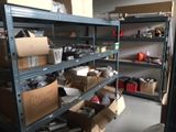 many boxes and boxes on the shelves in the room
