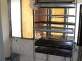 an image of a room with a rack of food in it