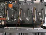 a close up of a computer motherboard with many wires
