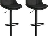 une paire de tabourets de bar noirs sur fond blanc