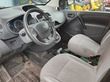 a yellow car with a steering wheel and a dashboard