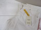 a picture of a pair of white pants with a tag on it
