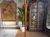a lamp that is sitting on the floor in a room