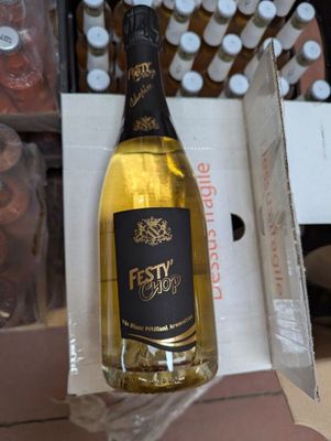 a bottle of wine that is sitting in a box