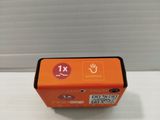 a small orange box with a qr code on it