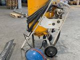 a picture of a machine that is sitting in a warehouse