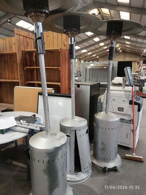 many different types of gas heaters in a warehouse