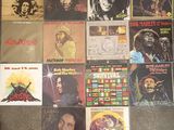 various bob marley records on display on the floor