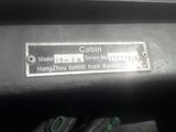 a close up of a metal plate on a vehicle ' s bumper