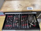 a lot of tools in the drawer of a tool box