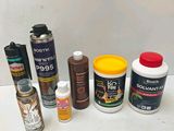 many different types of paint on the table
