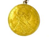 an image of a gold coin on a white surface