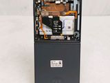 a picture of a cell phone with a broken battery