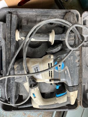 a box with tools in it sitting on the floor