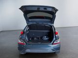 a car with its trunk open in a room
