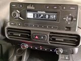 a radio in the center of a car with buttons on it