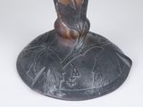 a vase that is sitting on a white table