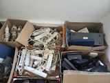 a box full of electronic devices and wires in it