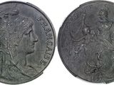 gros plan d'une pièce de monnaie sur laquelle figure une femme