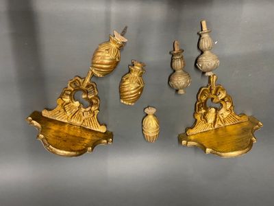 a lot of gold items on display on a table