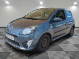 a picture of a small blue car parked in a garage