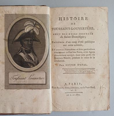 un vieux livre sur lequel figure l'image d'un homme portant un turban