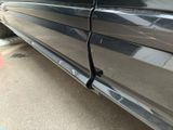 a close up of a car ' s door handle on the side of the car