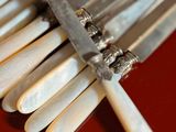 a bunch of white toothbrushes on a red table