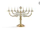 an image of a brass candelier with five candles on a stand