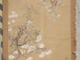 a picture of a scroll hanging on a wall