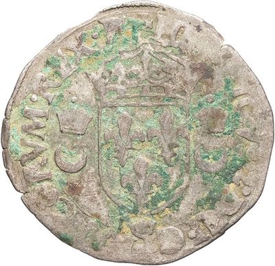an old coin with a shield on it