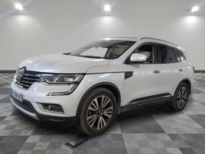 the white suv is parked in a large room with a checkered floor
