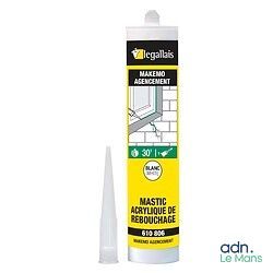 un gros plan d'un tube de colle à côté d'un autre tube de colle