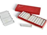 a box of cigarettes and a box of cigarettes on a white surface
