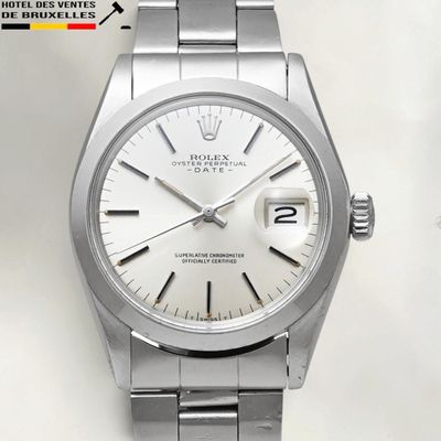 an image of a rolex stainless steel watch with a white dial