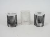 three glass vases sitting next to each other on a white surface