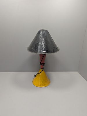 an image of a lamp that is on a table