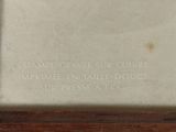 a picture of a plaque on the side of a building
